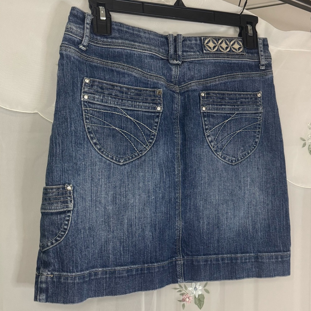 Y2K denim mini skirt with pockets and embellishments by NOIR